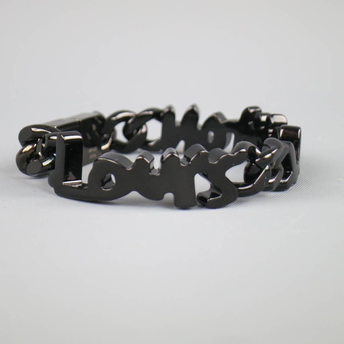 LOUIS VUITTON bracelet in a black metal chair featuring Stephen Sprouse style graffiti logo. With dust bag. Made in Italy. Retails at $705.00.
 
Excellent Pre-Owned Condition.
Marked: MP1403 LE 0134
 
Fits: 6 in.
