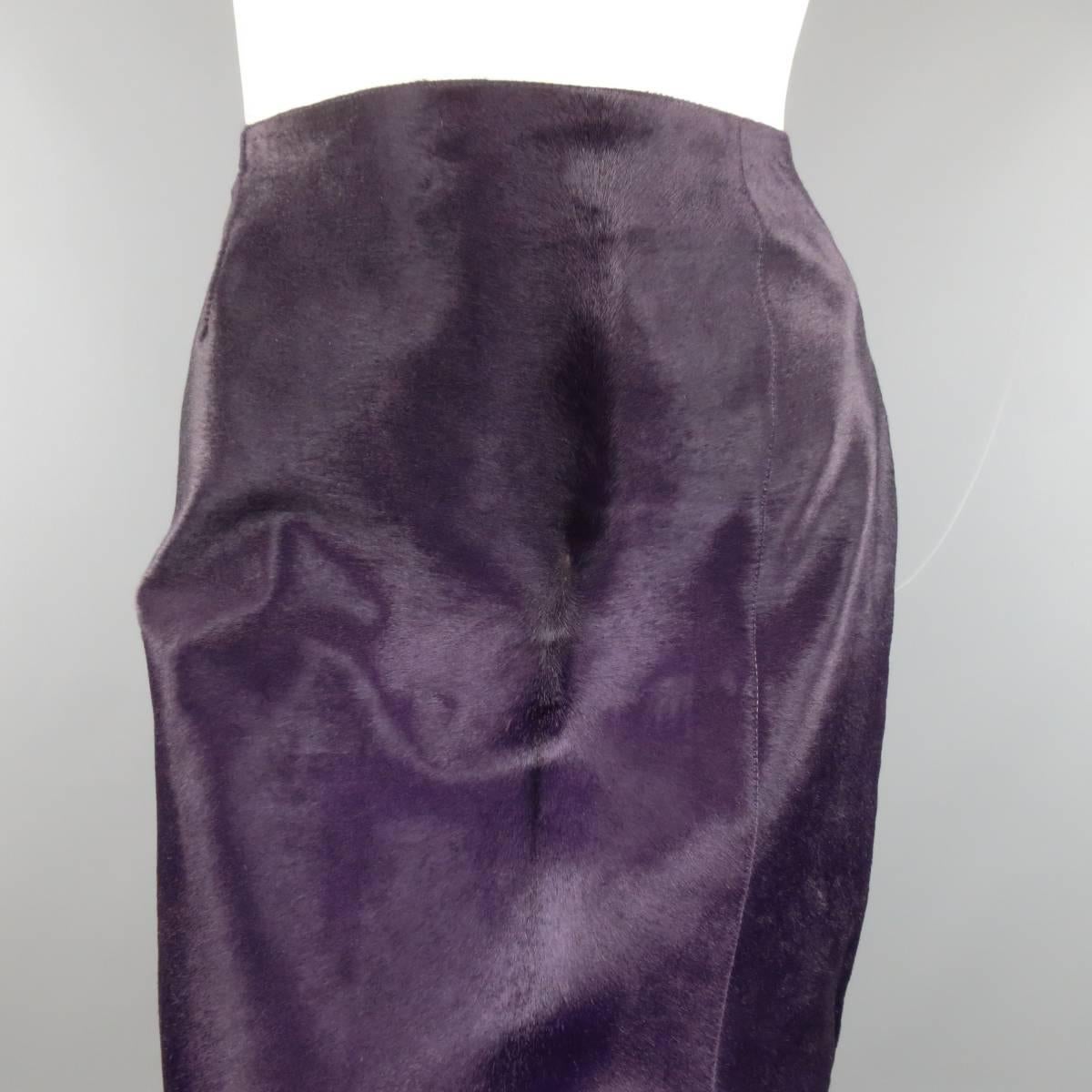 PAUL KA calf-hair pencil skirt with cupro lining features a zip closure and small slit above left knee in a rich eggplant purple. Made in France.
 
Excellent Pre-Owned Condition.
Marked: 40
 
Measurements :
 
Waste: 30 In.
Hip: 36 In.
Length: 22 In.