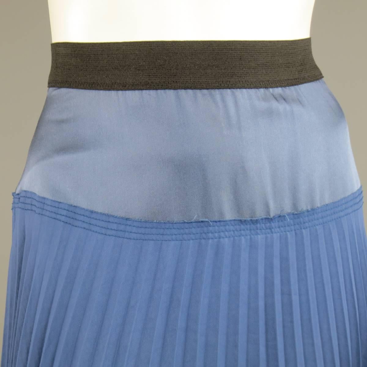 MARC JACOBS A line skirt features a satin waist panel, raw edge pleated twill full skirt panel, and black elastic waistband. Fully lined in silk. Made in USA.
Excellent Pre-Owned Condition. Marked: 4
Waste: 28 In.
Hips: 38 In.
Length: 23 In.