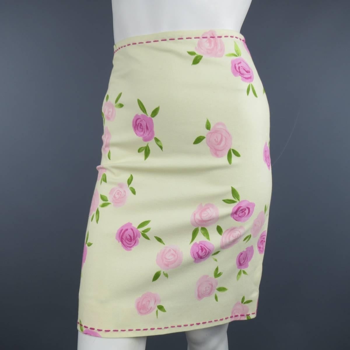 MOSCHINO CHEAP & CHIC pencil skirt in a soft yellow tone beige cotton canvas with all over pink and fuchsia rosette print and features top stitching along the hem lines. Made in Italy.
 
Excellent Pre-Owned Condition
Marked: 4 USA
 
Measurements:

