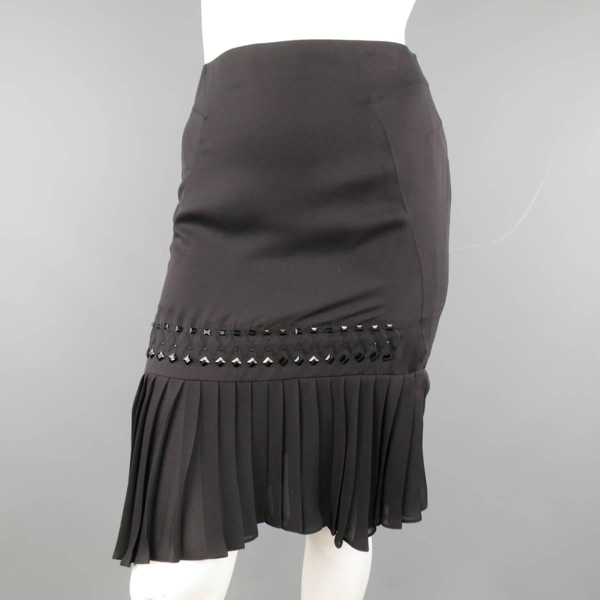 GUCCI pencil skirt in a light weight silk featuring a side paneled pencil silhouette, pleated hem, and embroidered diamond pattern with beading. Missing a Bead. As-Is. Made in Italy.
 
Good Pre-Owned Condition.
Marked: IT 38
 
Measurements:
 
Waist: