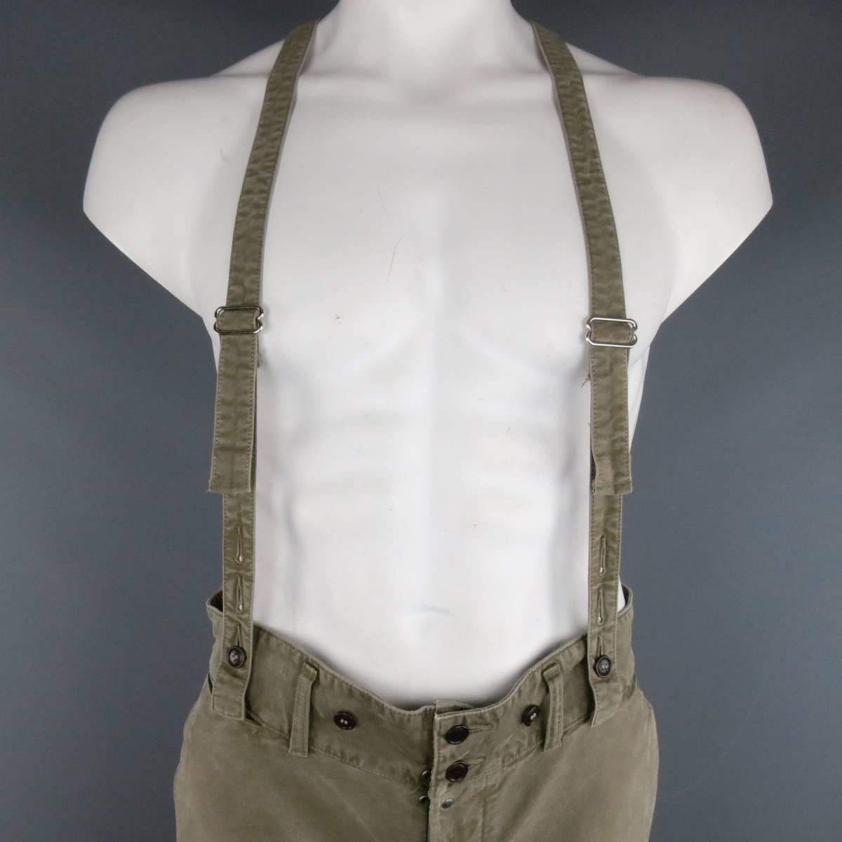 VISVIM casual pants in a washed light olive green cotton chino fabric featuring a thick two button waistband, double button patch pocket back, V cut back with adjustable back tab, and optional suspenders. Made in Japan.
 
Excellent Pre-Owned