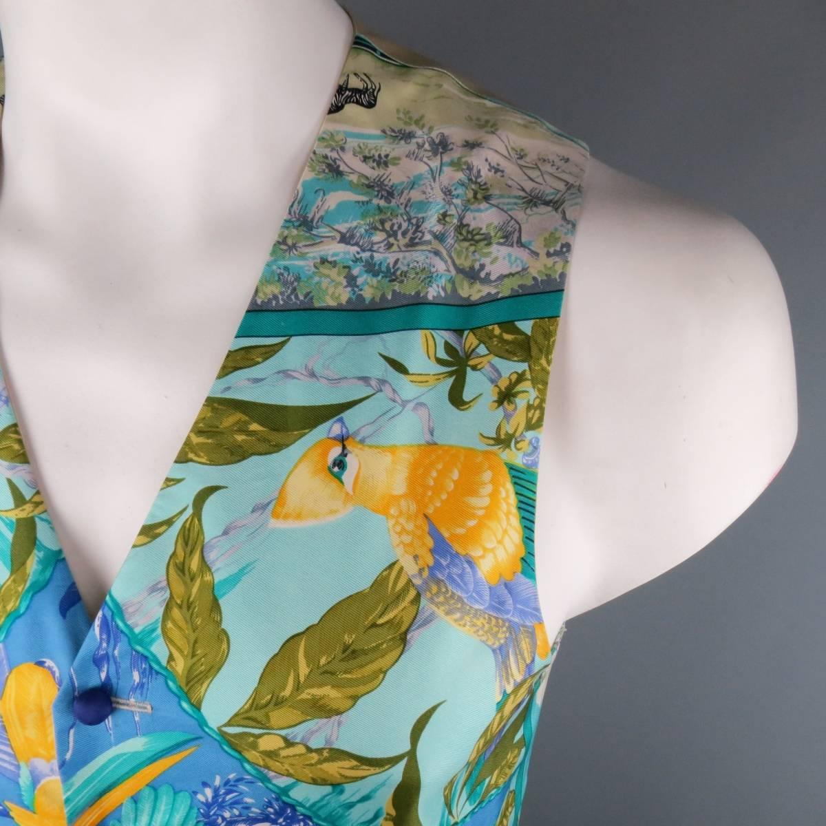 BRENDA KETT of San Francisco custom made vest featuring a vibrant turquoise and blue tropical bird print HERMES scarf front with yellow and lavender accents with silk covered buttons, and champagne satin twill back. Stain in detail shot.
 
Good