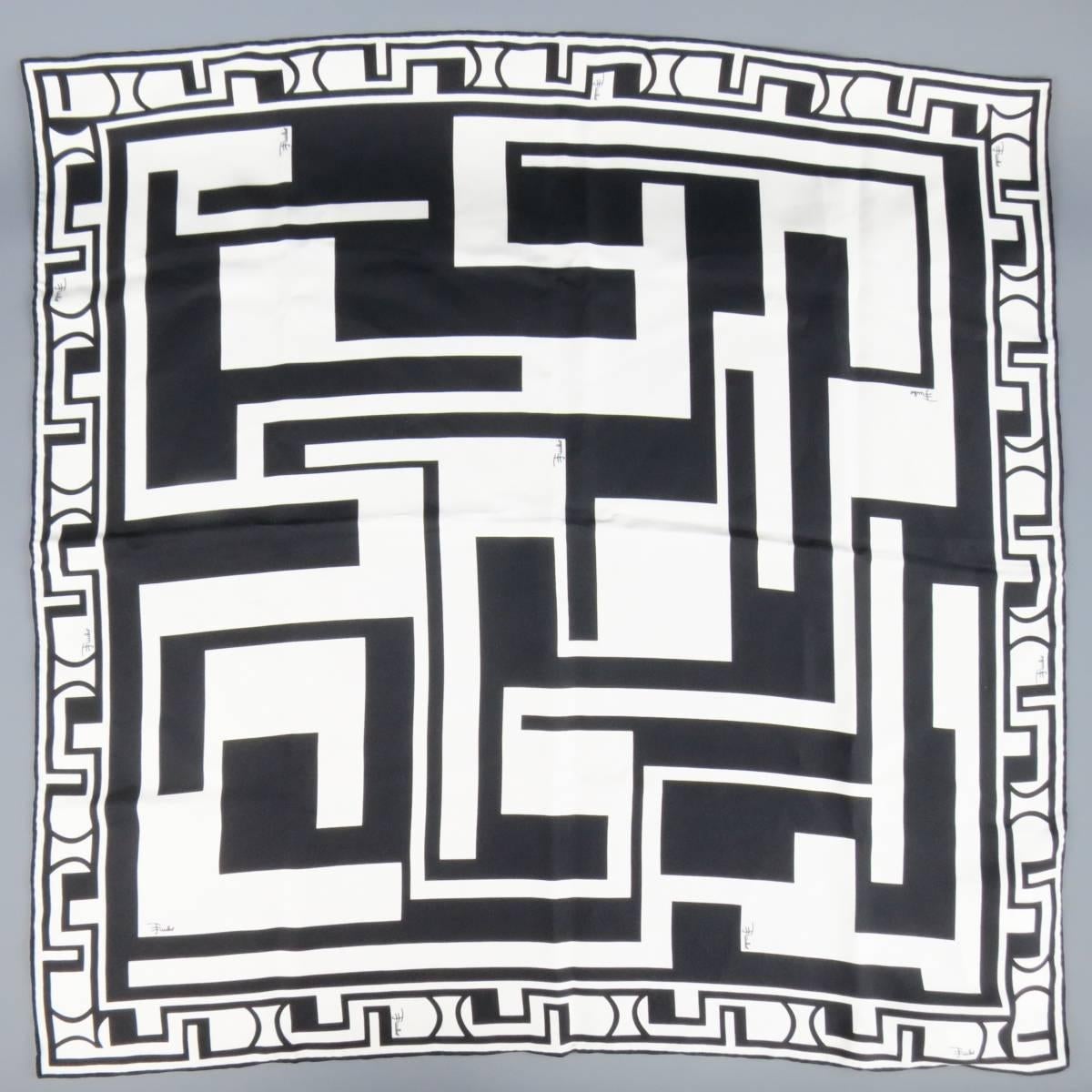 EMILIO PUCCI silk scarf features a black and white print of geometric squares. Made in Italy.
 
Excellent Pre-Owned Condition.
 
26.5 x 26.5 in.
