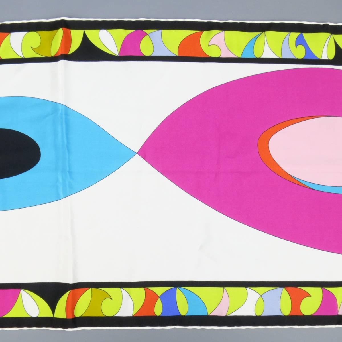 EMILIO PUCCI silk scarf features a multi-colored abstract geometric print with hues of fucsia, pink, orange, blue, and green on a black and white base. Made in Italy.
 
Excellent Pre-Owned Condition.
 
12.5 x 51 in.