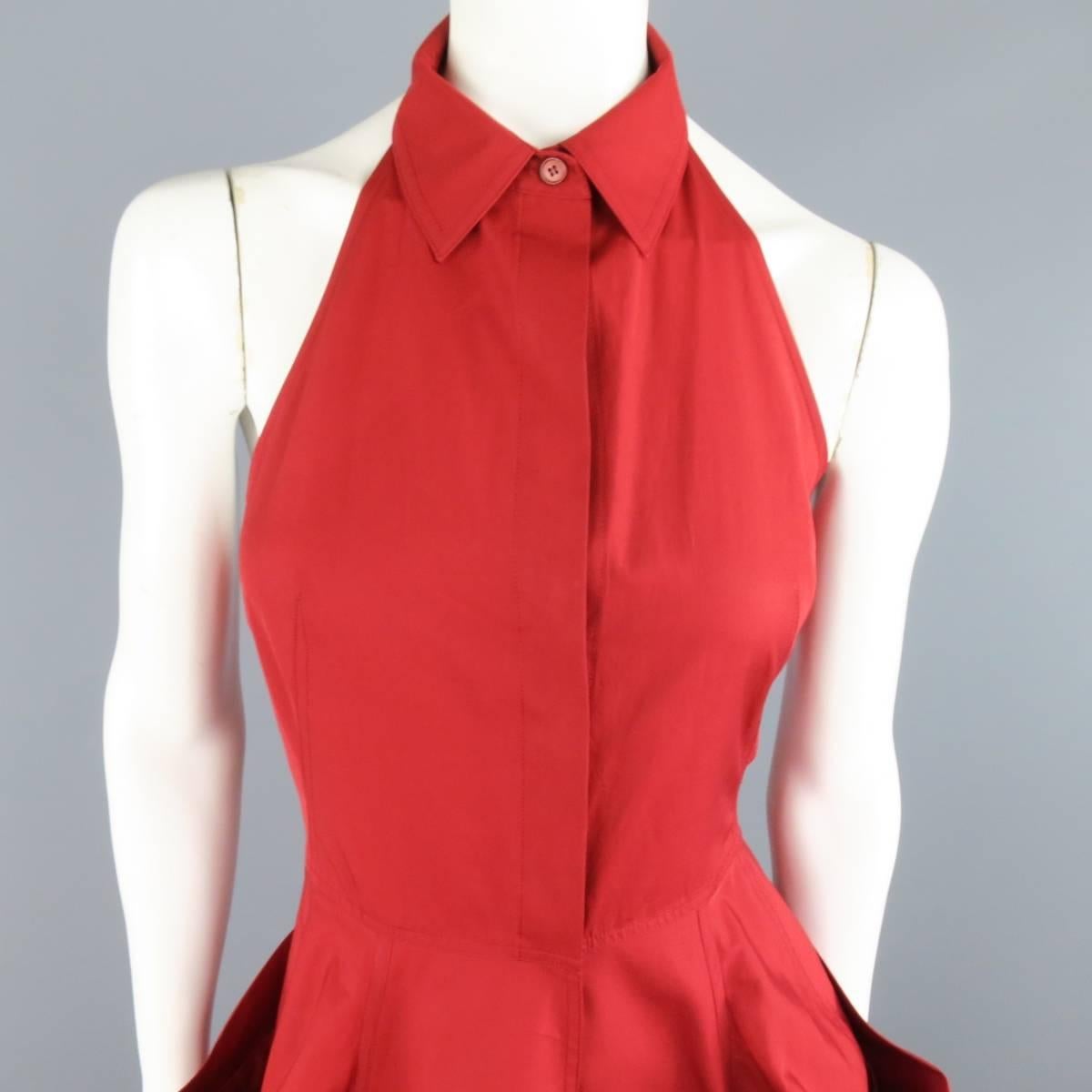 DONNA KARAN shirt dress in a red cotton featuring a hidden placket button and snap front, halter neckline with classic pointed collar, and full A-line skirt with draped panel pockets. Discolorations throughout. As-Is.
 
Good Pre-Owned