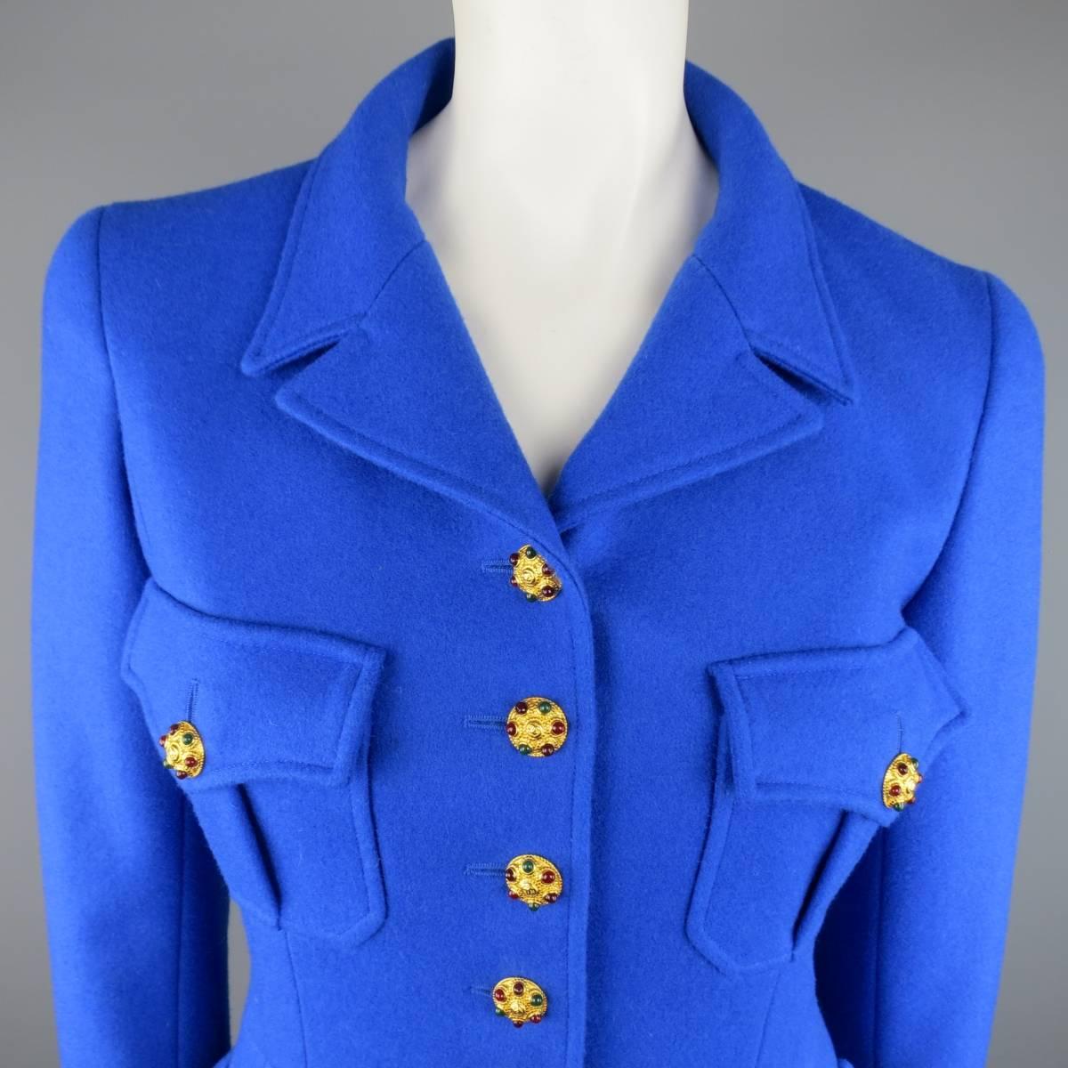 Rare and fabulous vintage CHANEL military jacket circa Fall/Winter 1996 Collection comes in a royal blue wool felt and features a tailored silhouette, pointed lapel, symmetrical patch flap pockets, six button closure with gorgeous yellow gold tone