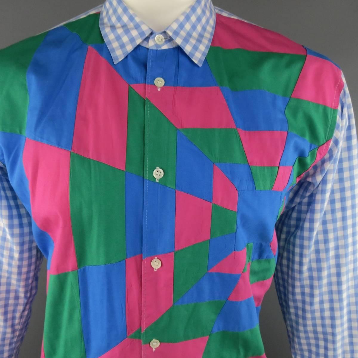 Unique COMME des GARCONS SHIRT button up in a classic light blue gingham plaid featuring a pointed collar and pink, blue, and green patchwork constructed, geometric frontal panel. Wear on seams. As-Is. Made in France.
 
Good Pre-Owned