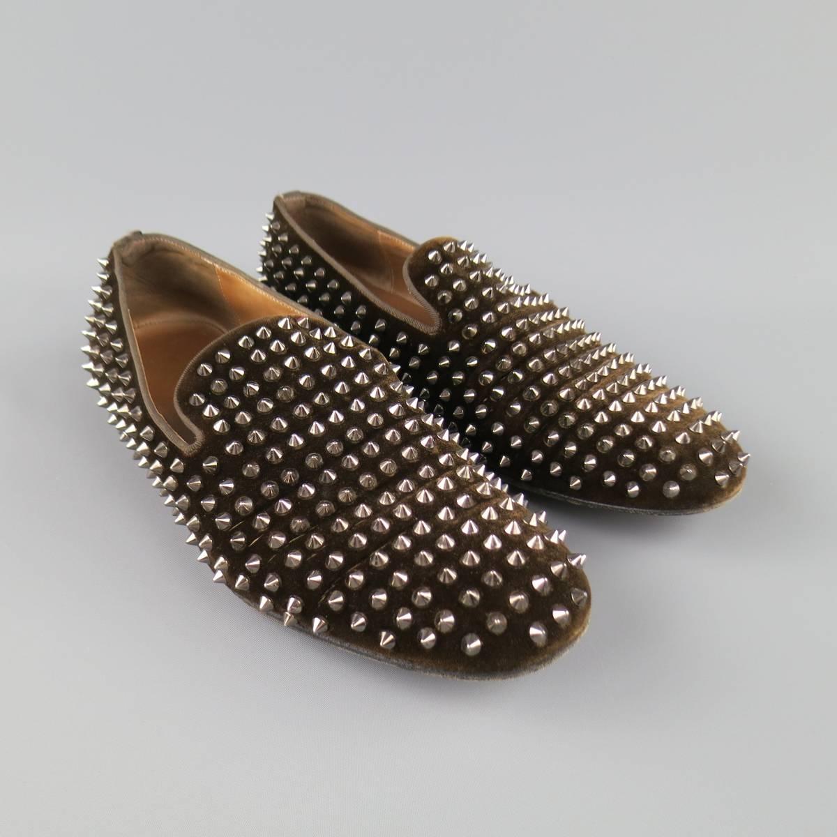 CHRISTIAN LOUBOUTIN  "Rollerboy Spikes" Loafer consists of velvet material in a brown color tone. Designed in a slip-on style, spike studs throughout body in a silver tone. Brown heel and red sole. Damaged bottom sole. Comes with original
