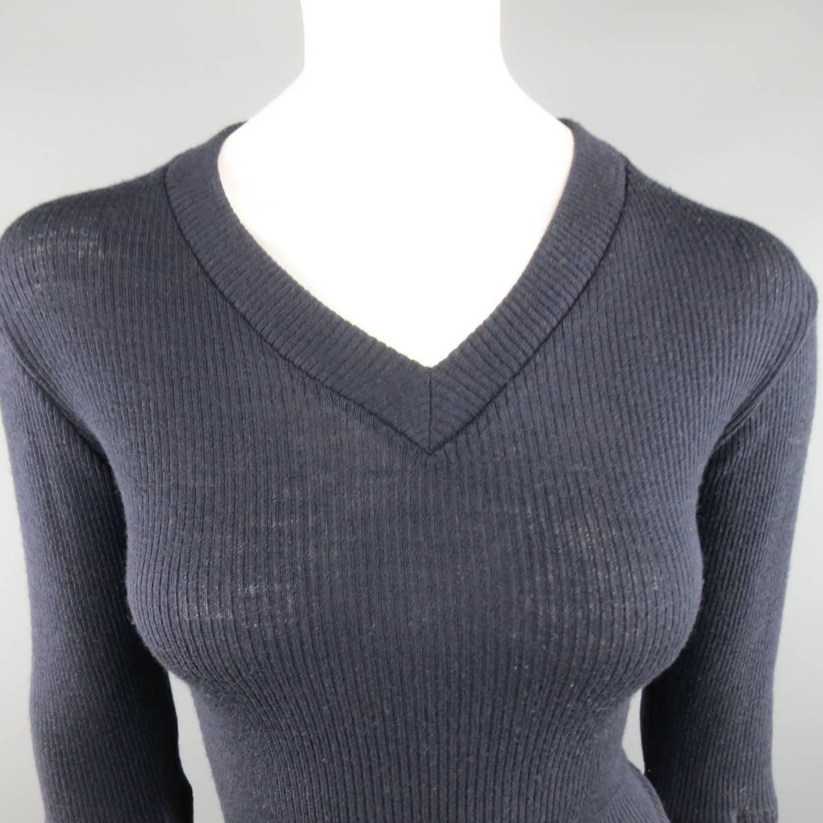 Vintage Y's by Yohji Yamamoto pullover in a sheer navy blue ribbed wool knit featuring a V neckline and extended cuffed sleeves with raw edge olive plaid fabric panels. Minor wear throughout. Made in Japan.
 
Good Pre-Owned Condition.
Marked: JP 3
