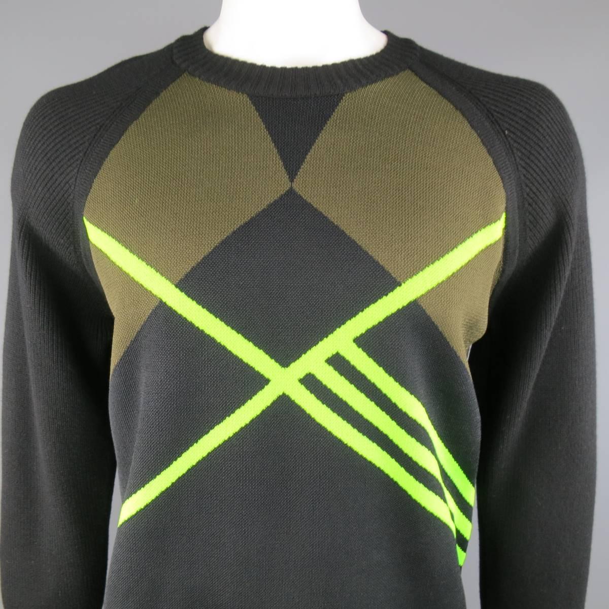 Y-3 by YOHJI YAMAMOTO crewneck sweater in an olive and black geometric pattern thick wool knit with neon green stripes throughout and ribbed raglan sleeves and back.
 
Excellent Pre-Owned Condition
Marked Size: L/G
 
Measurements
 
Shoulders: 18