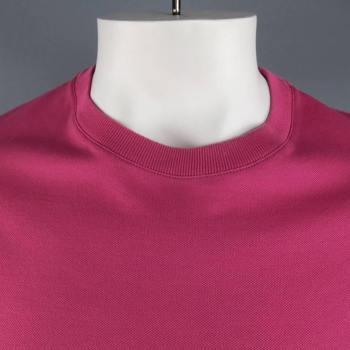 Vintage HERMES short sleeve T-shirt in a pink cotton pique with a ribbed crewneck and patch pocket with embroidered H emblem. Made in France.
 
Excellent Pre-Owned Condition. Retails at $345.00.
Marked: XL
 
Measurements:
 
Shoulder: 18 in.
Chest: