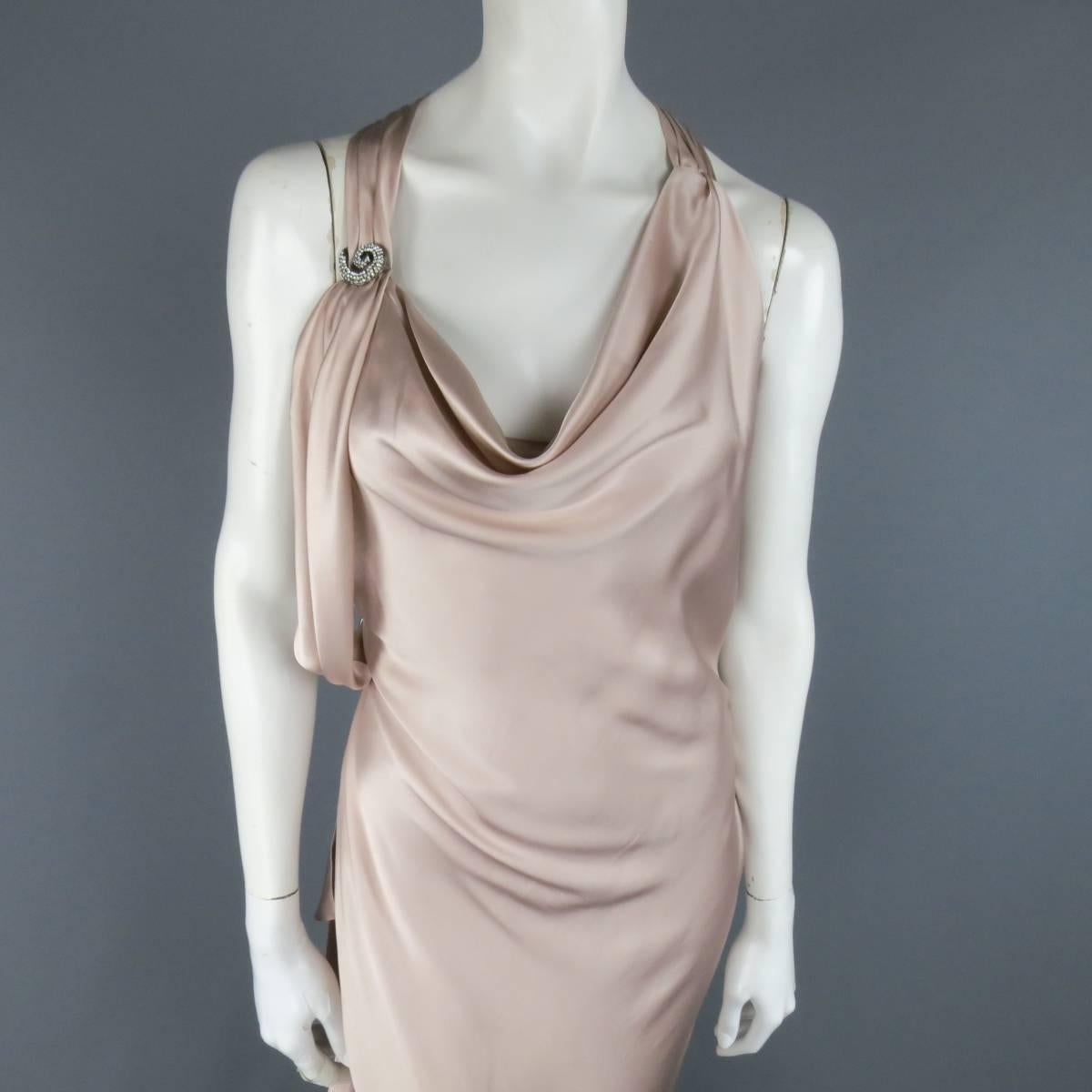 This stunning RALPH LAUREN Fall 2009 Collection gown comes in a light champagne pink silk satin and features an asymmetrical scoop drape bust line with gathered straps that connect in the back, side strap with rhinestone studded brooch appliques,