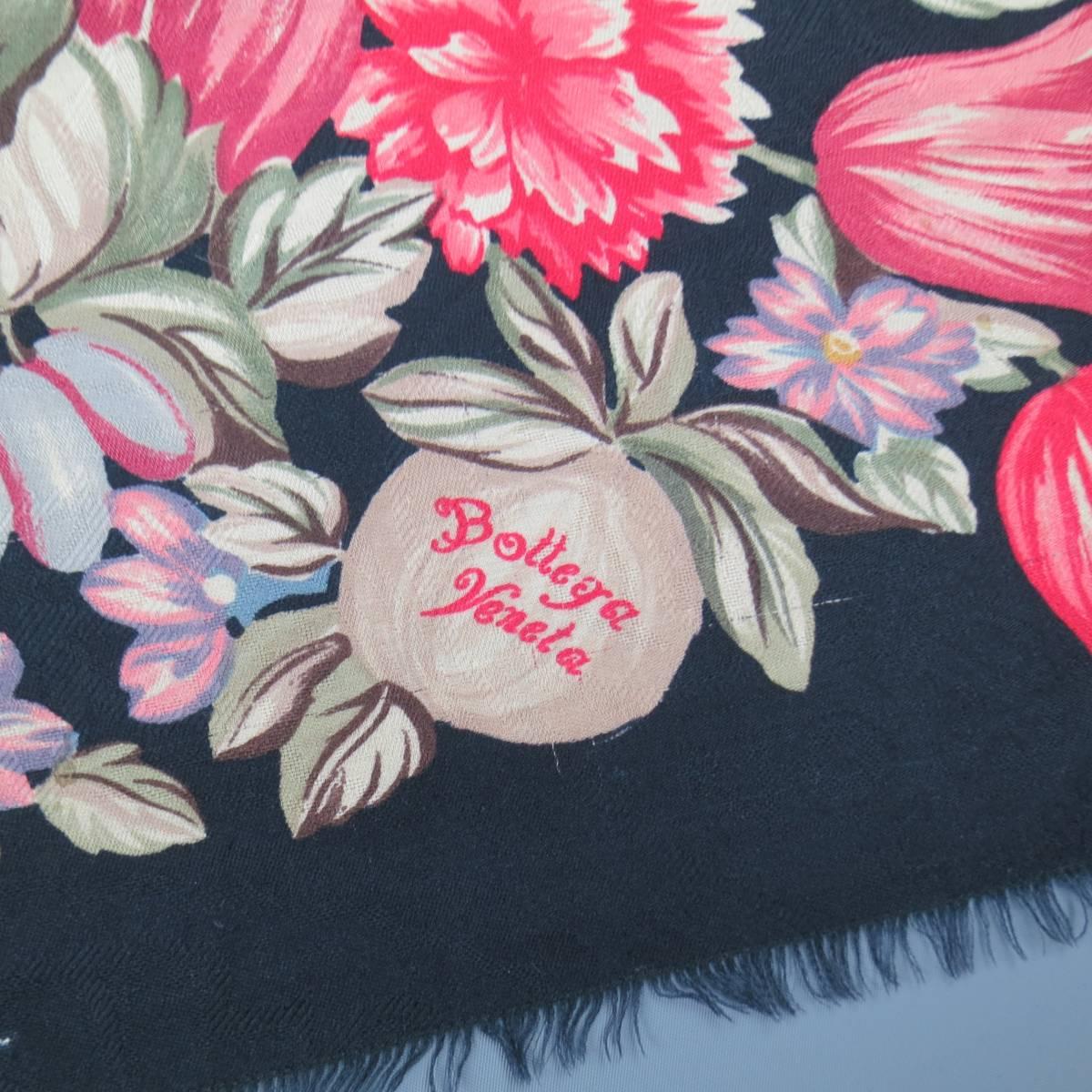 This gorgeous vintage BOTTEGA VENETA shawl comes in a soft black paisley textured wool silk blend gauze with raw fringed edges and all over multicolor floral print pattern. Tags removed. Made in Italy.
 
Good Pre-Owned Condition.
 
55 X 55 in.

