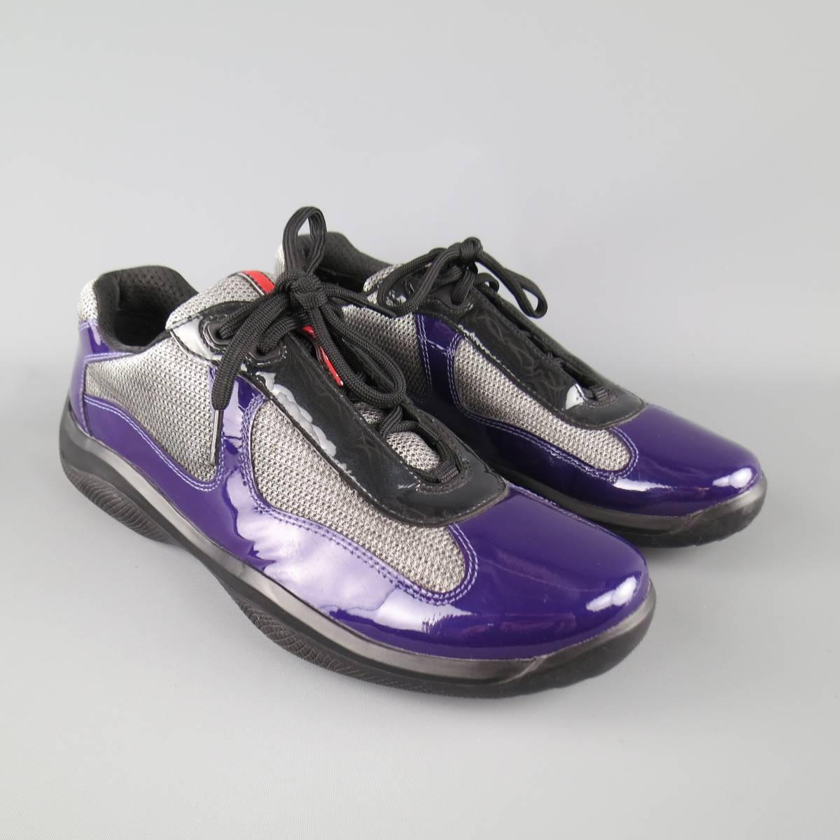 PRADA statement shoes come in a silver padded mesh with purple and black patent leather details and thick black rubber sole.
 
Excellent Pre-Owned Condition.
Marked: UK 8.5
 
Outsole: 11.5 x 4 in.