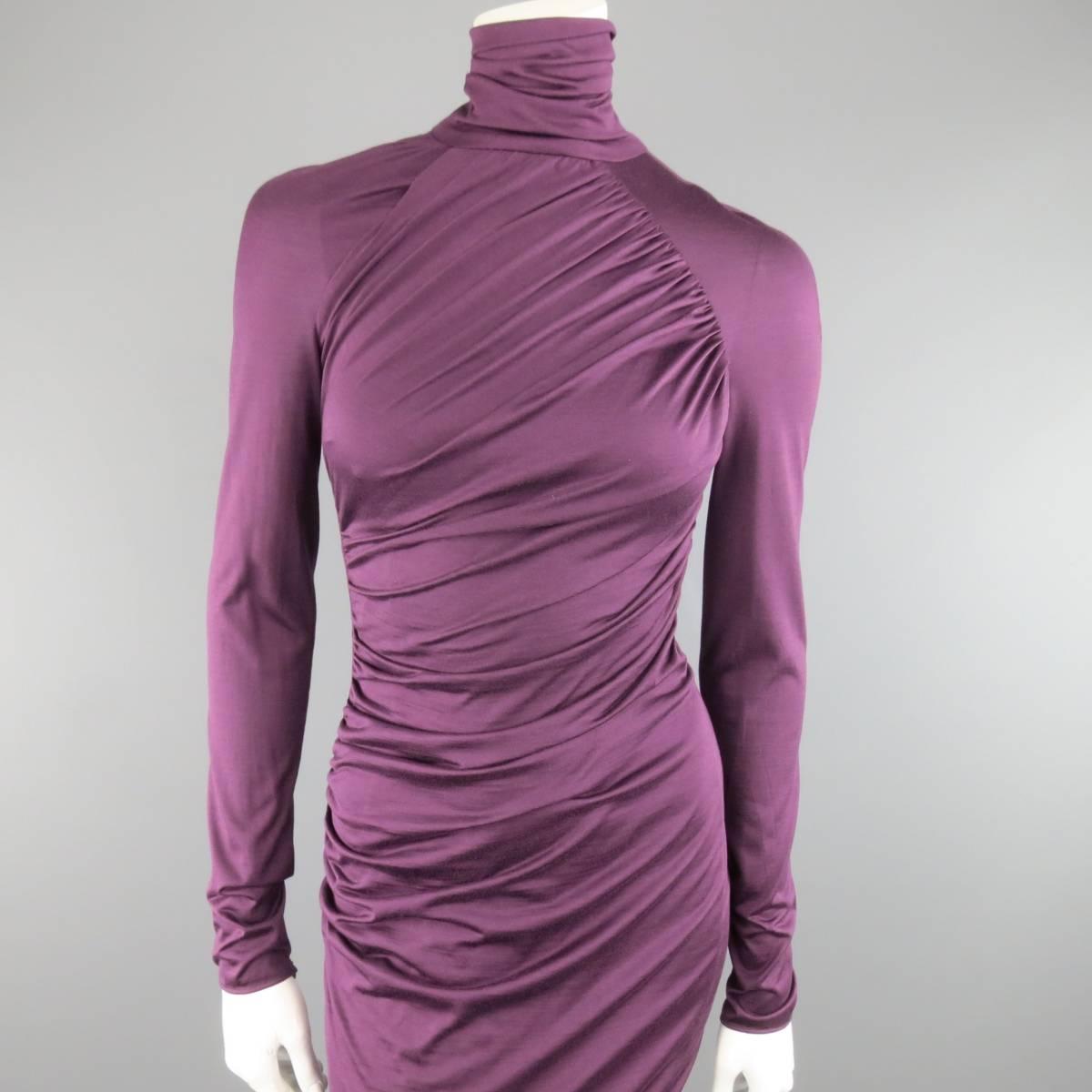GIAMBATTISTA VALLI bodycon midi dress in a violet purple stretch silk jersey featuring long sleeves, high neck, and asymmetrical ruched drape details. Made in Italy.
 
Excellent Pre-Owned Condition.
Marked: 40/XS
 
Measurements:
 
Shoulder: 16