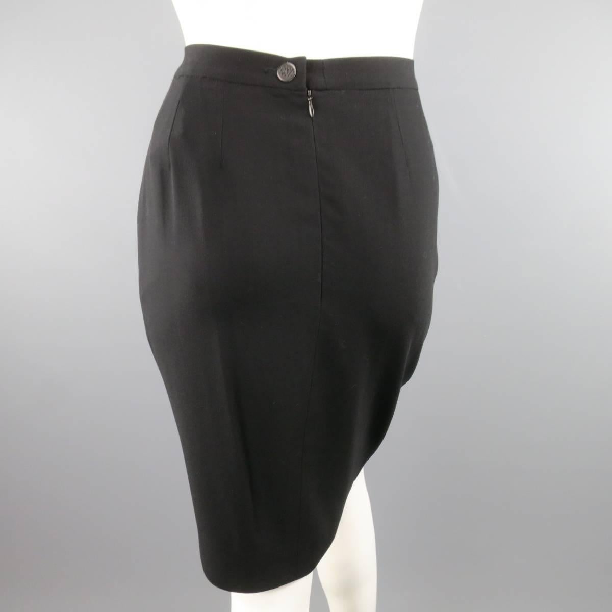 CHANEL sold black wool pencil skirt features zipper and single button closure in the back. Made in France.
 
Good Pre-Owned Condition.
Marked: 38
 
Measurements:
 
Waist: 27 In.
Hips: 38 In.
Length: 21.5 In.