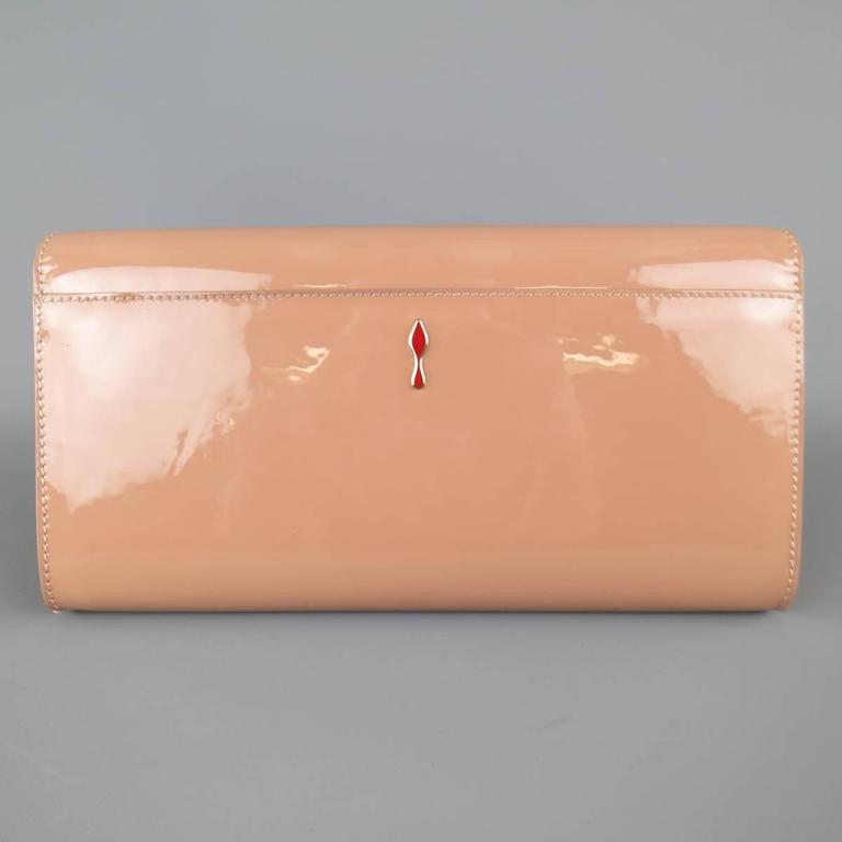 nude louboutin clutch bag