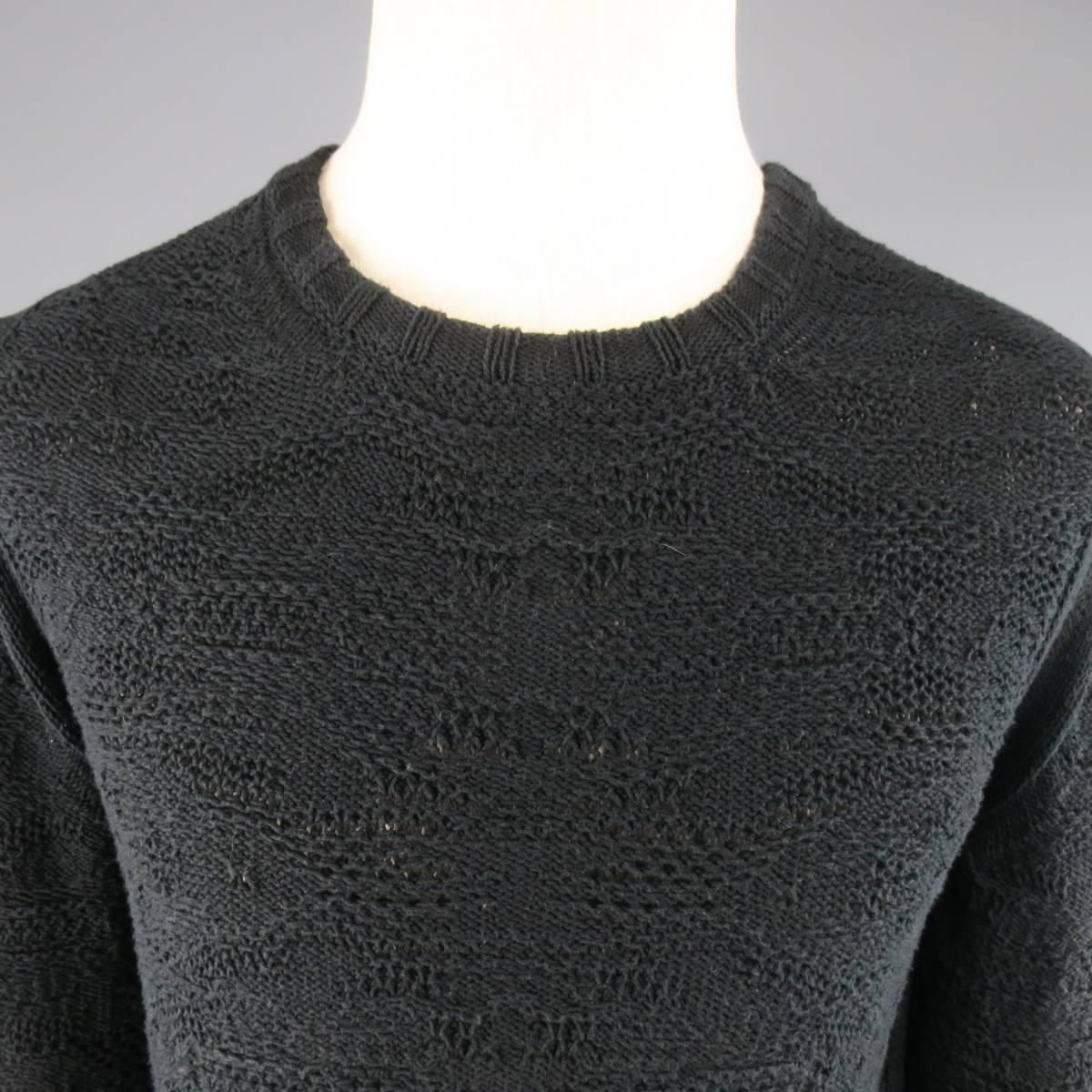 SILENT by DAMIR DOMA pullover sweater in a textured soft navy black knit featuring a crewneck, ribbed cuffs, and side slits.
 
Excellent Pre-Owned Condition.
No Tag.
 
Measurements:
 
Shoulder: 19 in.
Chest: 40 in.
Sleeve: 26 in.
Length: 32 in.