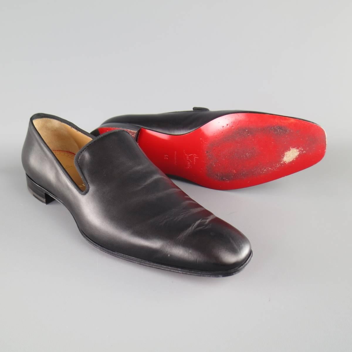 CHRISTIAN LOUBOUTIN "Dandelion Flat" loafers in a smooth black leather with a squared off pointed toe and red sole. With Box. Made in Italy.
 
Excellent Pre-Owned Condition.
Marked: IT 42
 
Outsole: 12 x 4 in.
