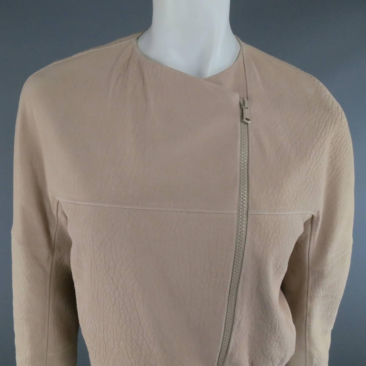 BRUNELLO CUCINELLI moto jacket comes in a muted rose pink wrinkle textured leather and featuring a collarless neckline, tonal asymmetrical double zip closure, and silk lining. Imperfection on back. Made in Italy.
 
Good Pre-Owned Condition.
Marked: