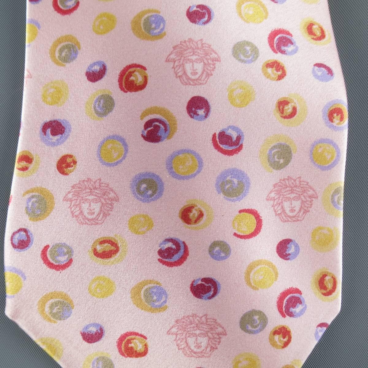 GIANNI VERSACE Vintage Tie consists of 100% silk material in a pink color tone. Designed in a classic style, multi-color polka-dot pattern with signature Medusa print.
Made in Italy.
 
Excellent Pre-Owned Condition
 
Measurements
 
Width: 10