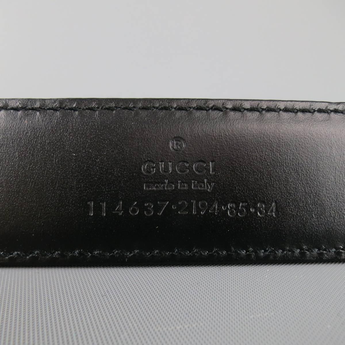 GUCCI belt features a black textured leather strap and silver tone bamboo style G buckle. Made in Italy.
 
Good Pre-Owned Condition.
Marked: 85.34
 
Length: 40 in.
Width: 1.25 in.
Fits: 33-35 in.
Buckle: 2.75 x 1.75 in.