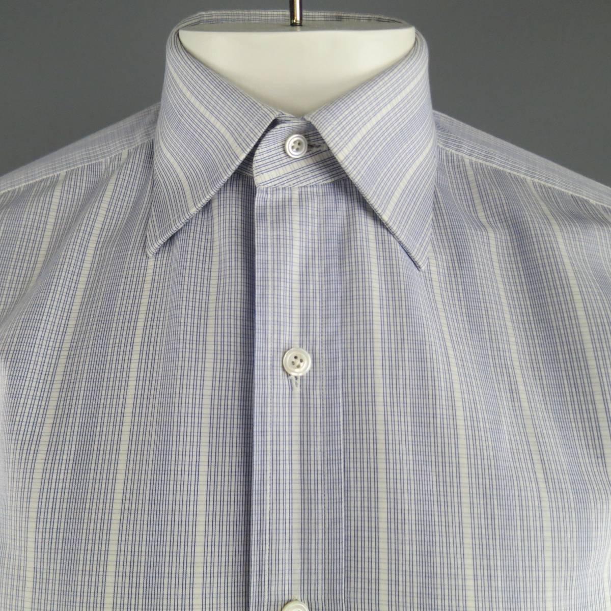 TOM FORD pointed collar dress shirt in a white cotton with all over blue abstract linier windowpane print. Made in Switzerland.
 
Excellent Pre-Owned Condition.
Marked: 39/15.5
 
Measurements:
 
Shoulder: 18 in.
Chest: 42 in.
Sleeve: 27 in.
Length: