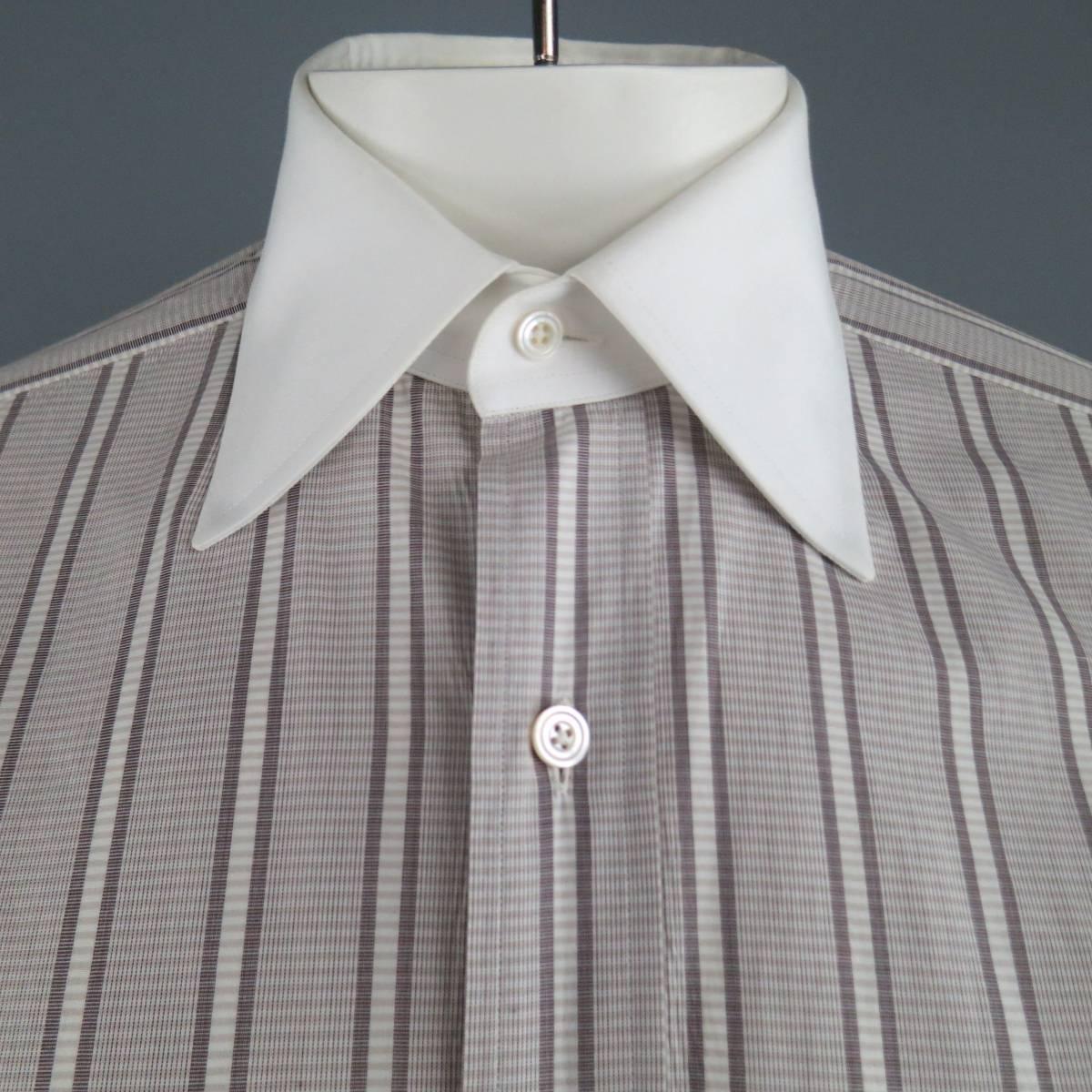 TOM FORD dress shirt in a white cotton with all over taupe stripe pattern featuring a pointed white contrast collar and French cuffs. Discoloration at shoulder. As-Is. Made in Italy.
 
Fair Pre-Owned Condition.
Marked Size: 39/ 15.5
 
Measurements:
