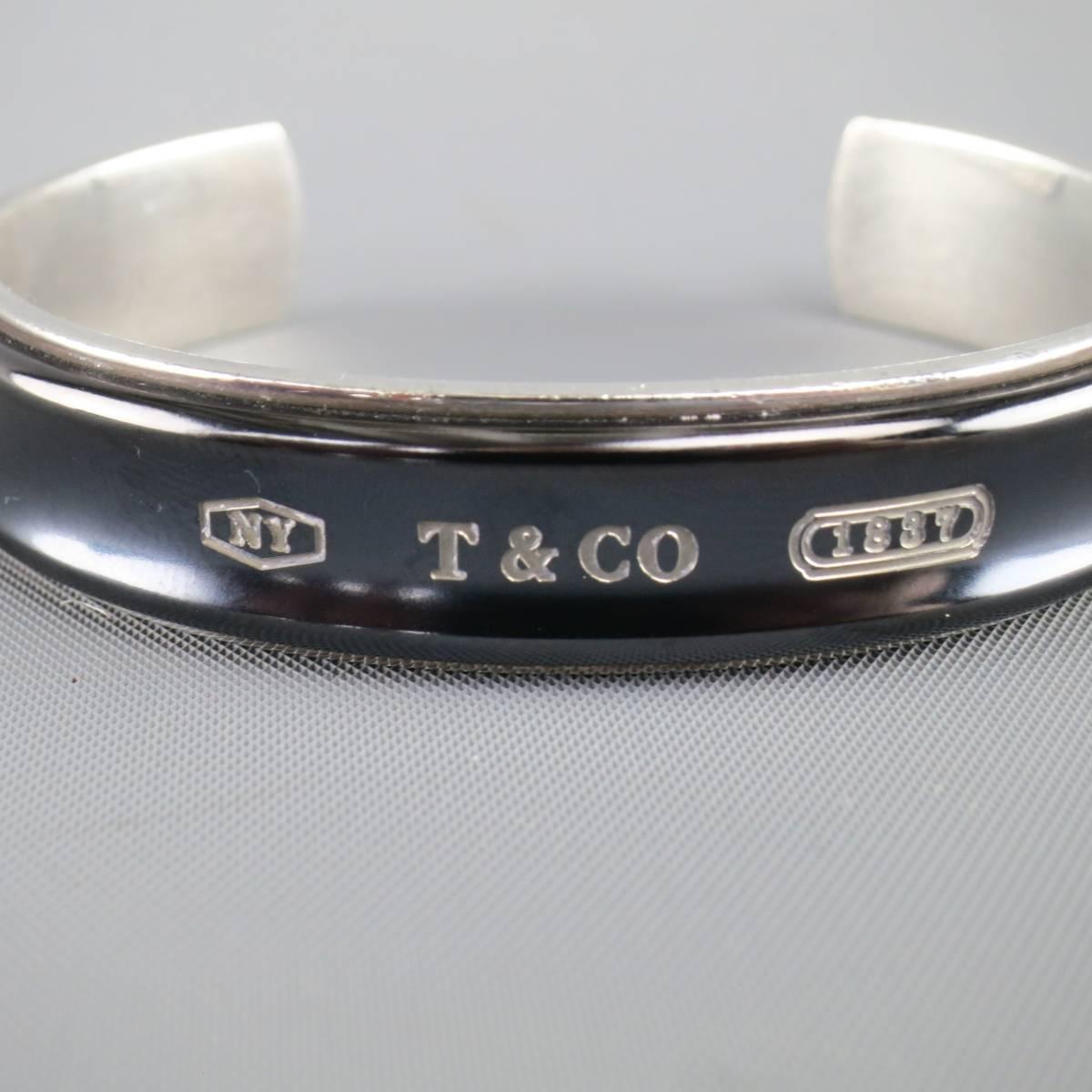TIFFANY & CO. cuff bracelet in sterling silver featuring a midnight titanium band with 
