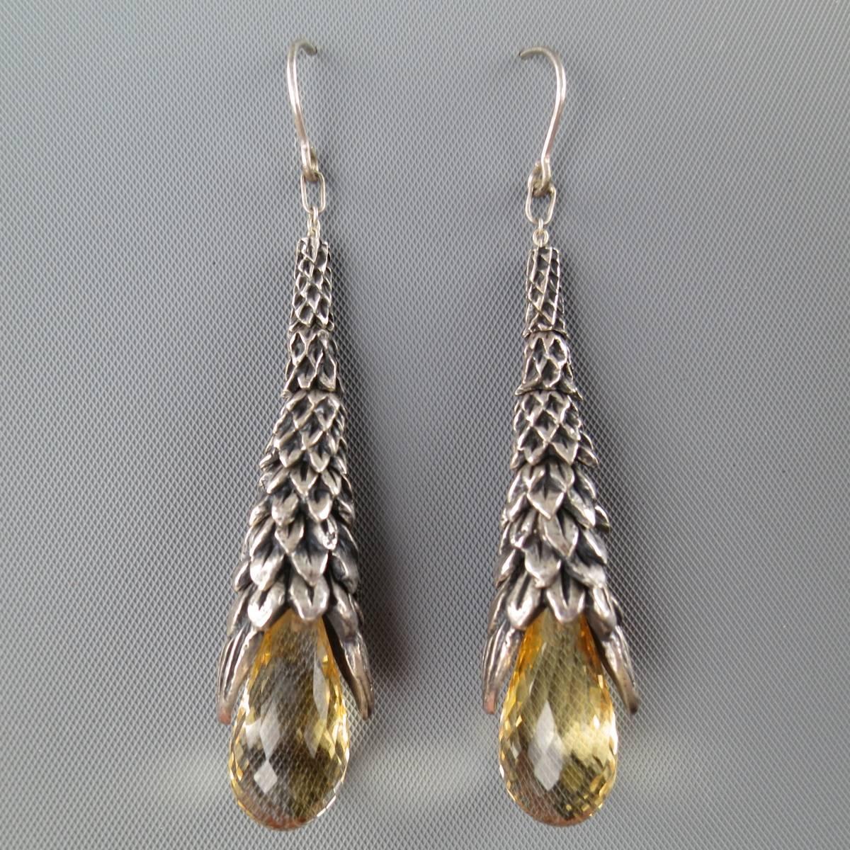 UGO CACCIATORI dangle earrings feature a leaf textured sterling silver drop with tear shaped smokey quartz crystal.
 
Excellent Pre-Owned Condition.
Marked: 925
 
Length: 7 cm.
Width: 1 cm.


Web ID: 82043 