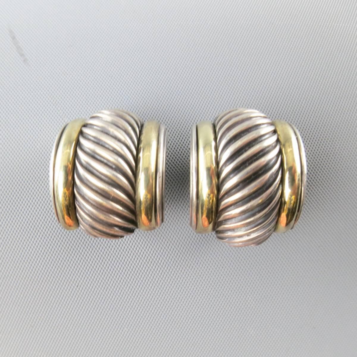 DAVID YURMAN post earrings come in a thick textured sterling silver half hoop with 14k gold piping.
 
Good Pre-Owned Condition.
Marked: 585 .925
 
Length: 2.45 cm.
Width: 1.45 in.


Web ID: 82034 