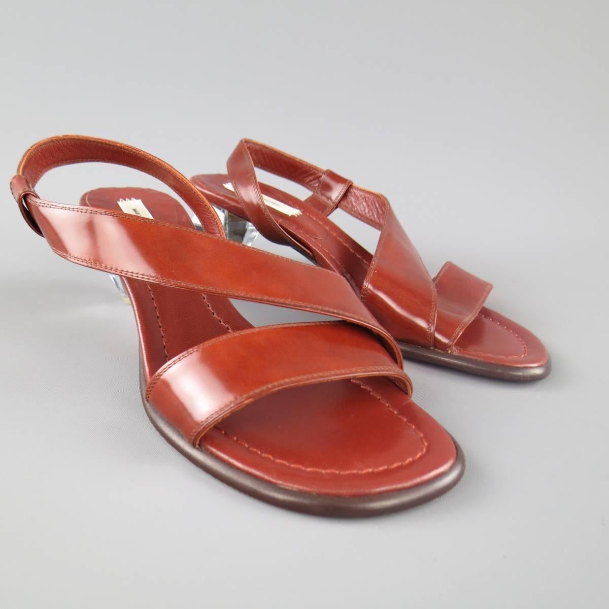 MARC JACOBS sandals in a tan leather featuring a diagonal strap and oversized crystal diamond cut heel.  Made in Italy.
 
Never Worn.
Marked: IT 37
 
Heel: 2.5 in.


Web ID: 67828 