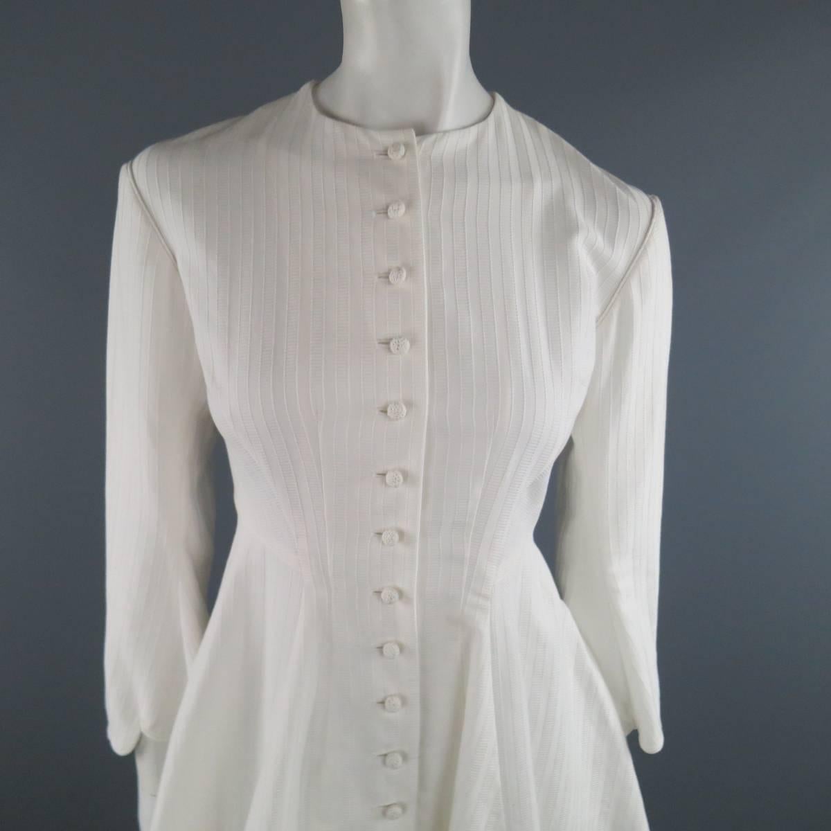 Ralph Lauren Collection shirt dress comes in white stripe textured cotton and features a round neckline, knit button closure, loose sleeves, cinch waist silhouette, and pleated skirt with high low scalloped hem. Made in USA.
 
New with Tags.
Marked: