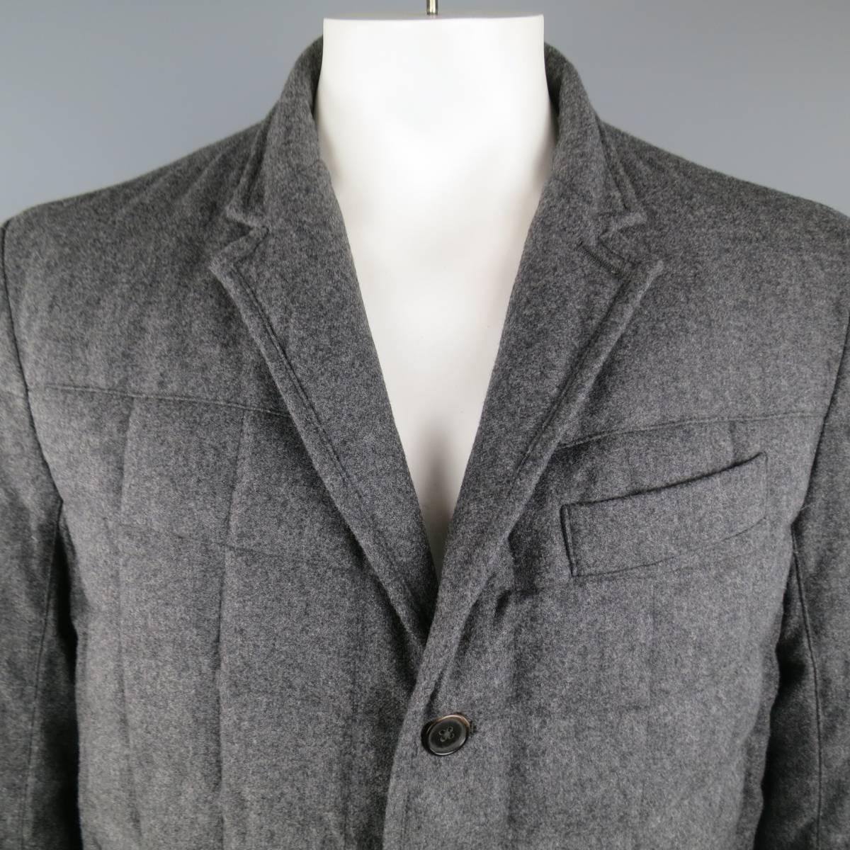 BLACK FLEECE by THOM BROWNE sport coat style jacket in a charcoal Heather gray quilted down filled wool featuring a notch lapel, three button closure, and triple flap pockets.
 
Excellent Pre-Owned Condition.
Marked: BB4
 
Measurements:
 
Shoulder: