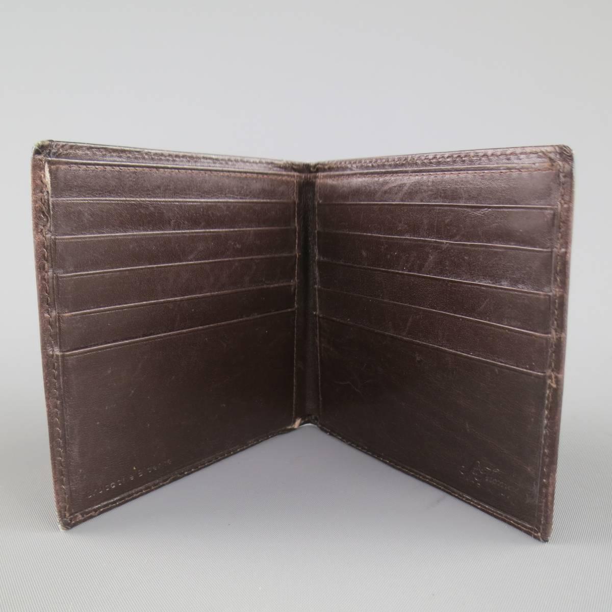 Vintage ST. THOMAS bifold wallet in a dark brown high shine crocodile leather with smooth leather interior. Wear throughout. With dust bag. Made in Italy.
 
Fair Pre-Owned Condition.
 
4 x 4 in.


Web ID: 82309 
