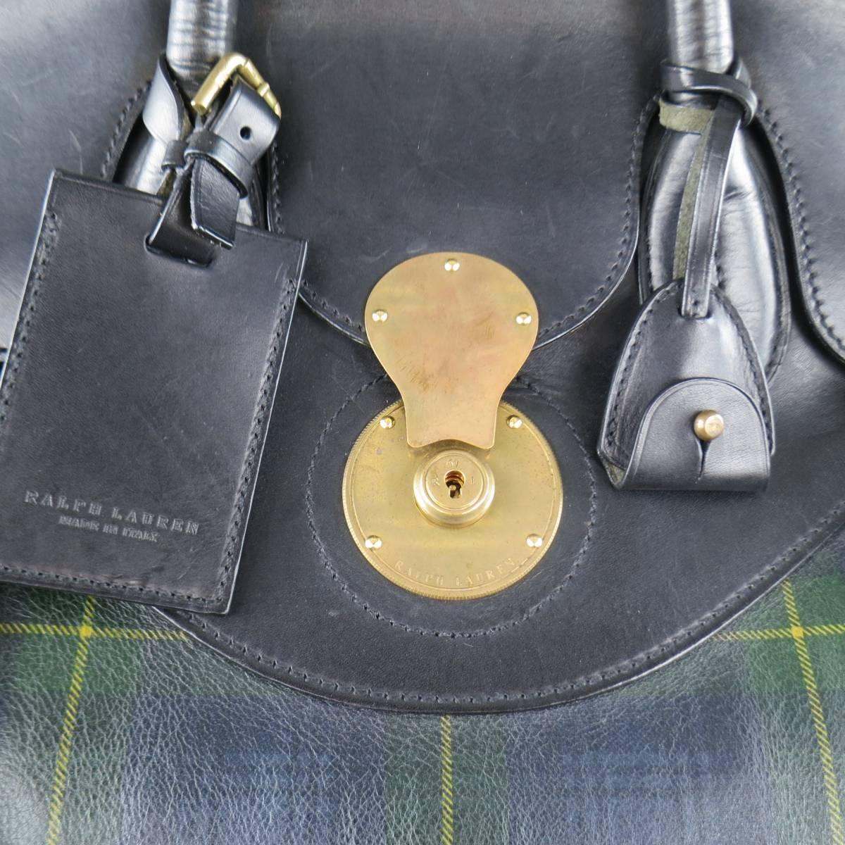 RALPH LAUREN Cooper travel bag comes in green and navy blue tartan plaid leather and features black leather flap and piping, double covered top handles, dark gold tone lock and double belt closures, and leather key clochette and luggage tag. Wear