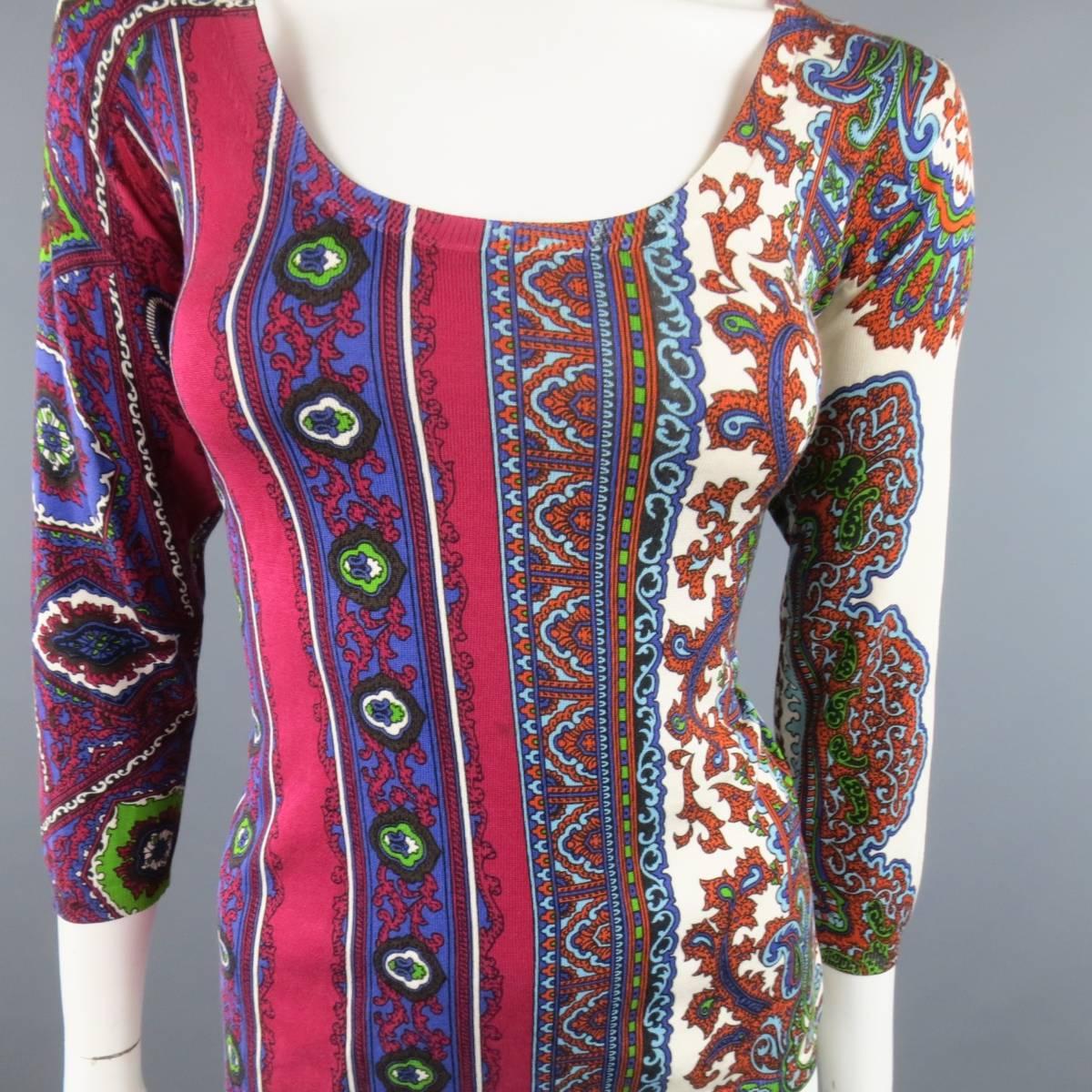 ETRO scoop neck, three quarter sleeve pullover sweater comes in a light weight beige knit with allover burgundy & purple abstract paisley print. Care tags removed. Made in Italy.
 
Good Pre-Owned Condition.
Marked: 44
 
Measurements:
 
Shoulder: 18