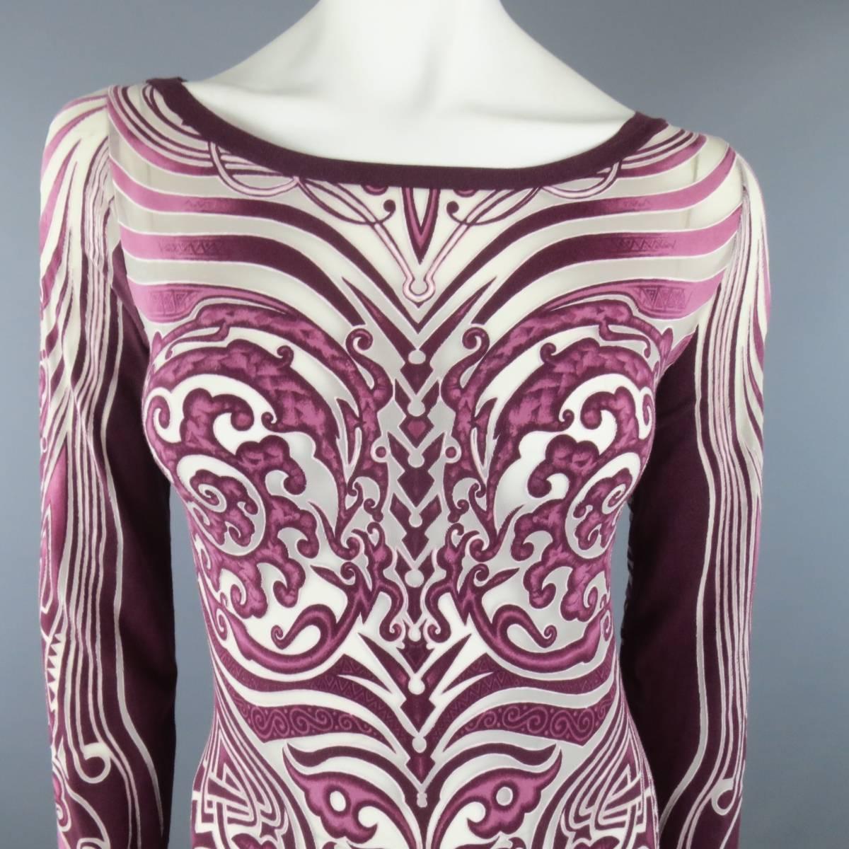 Rare vintage JEAN PAUL GAULTIER mini dress comes in a sher and opaque burnout tribal tattoo print grape burgundy magenta with a boat neck and long sleeves. Made in Italy.
 
Good Pre-Owned Condition.
Marked: L
 
Measurements:
 
Shoulder: 13.5