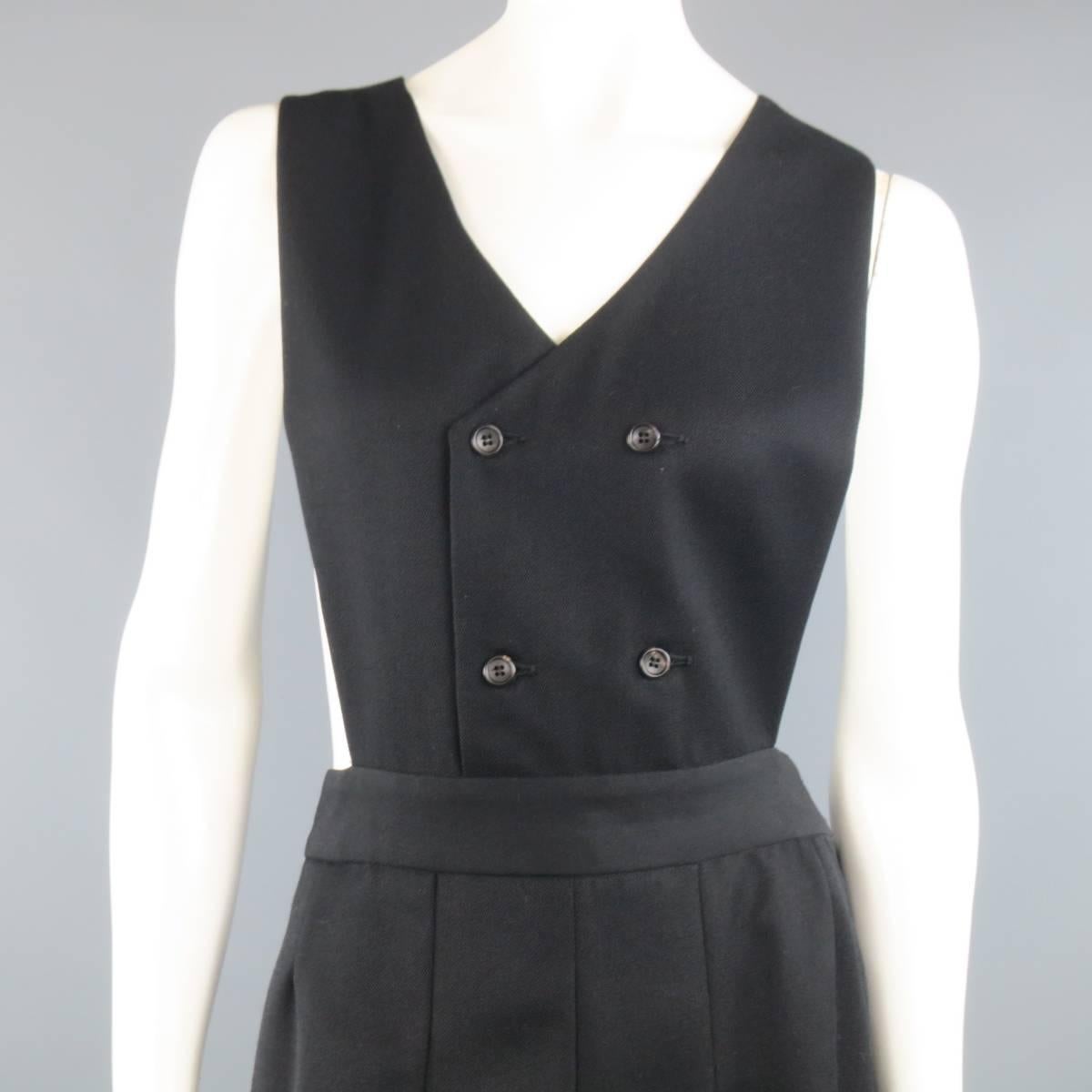 Comme des Garcons shirt dress comes in a black wool twill and features a double breasted, V neck, bib vest top with box pleated A line skirt. Made in France.
 
Excellent Pre-Owned Condition.
Marked: X
 
Measurements:
 
Shoulder: 13 in.
Bust: 11.5