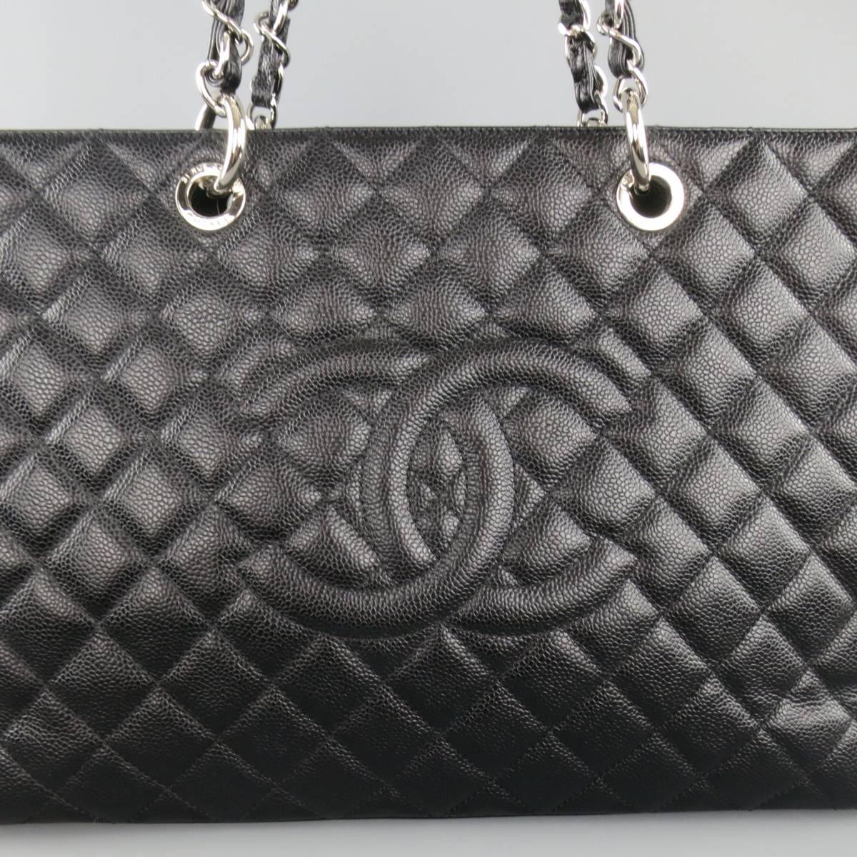 CHANEL Grand Shopper tote bag comes in a black quilted Caviar pebble texture leather and features silver tone 