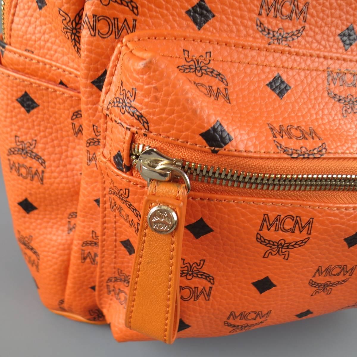MCM Orange Monogram Coated Canvas Studded Backpack 1