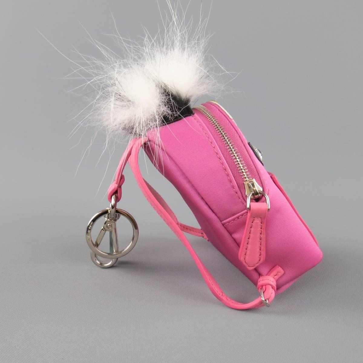 FENDI Micro Backpack Monster keychain comes in pink nylon with black, yellow, and white leather patch details, crystal eyes, and Fox & Nutria fur trim. Made in Italy.
 
New Without Tags. Retails at $1050.00.
 
Measurements:
 
Length: 3.5 in.
Width: