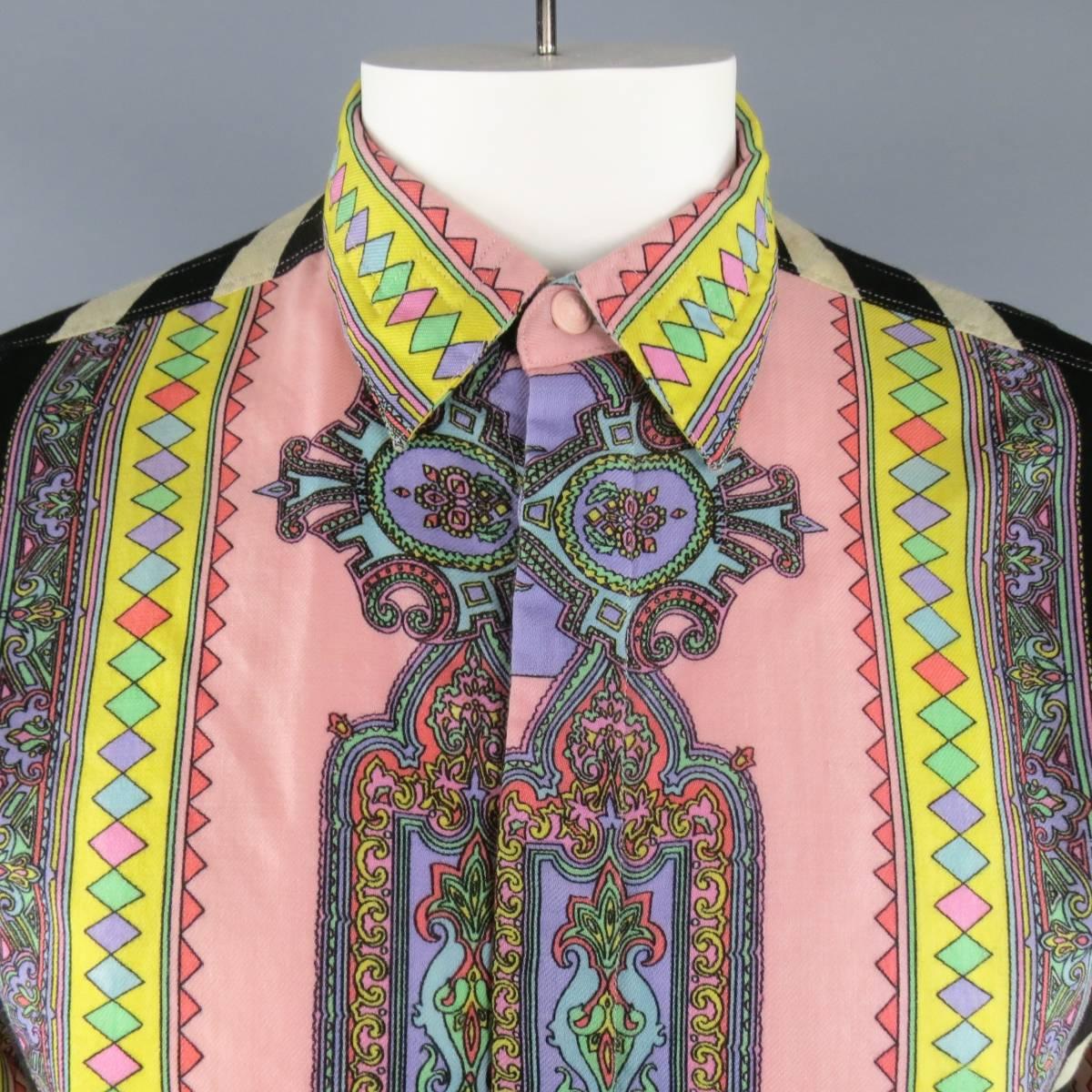 Vintage VERSUS by GIANNI VERSACE shirt from the late 1980's - early 1990's comes in a light weight wool twill and features a hidden placket front with pink lion head button, pointed collar, and all over multi-color pastel and black and beige
