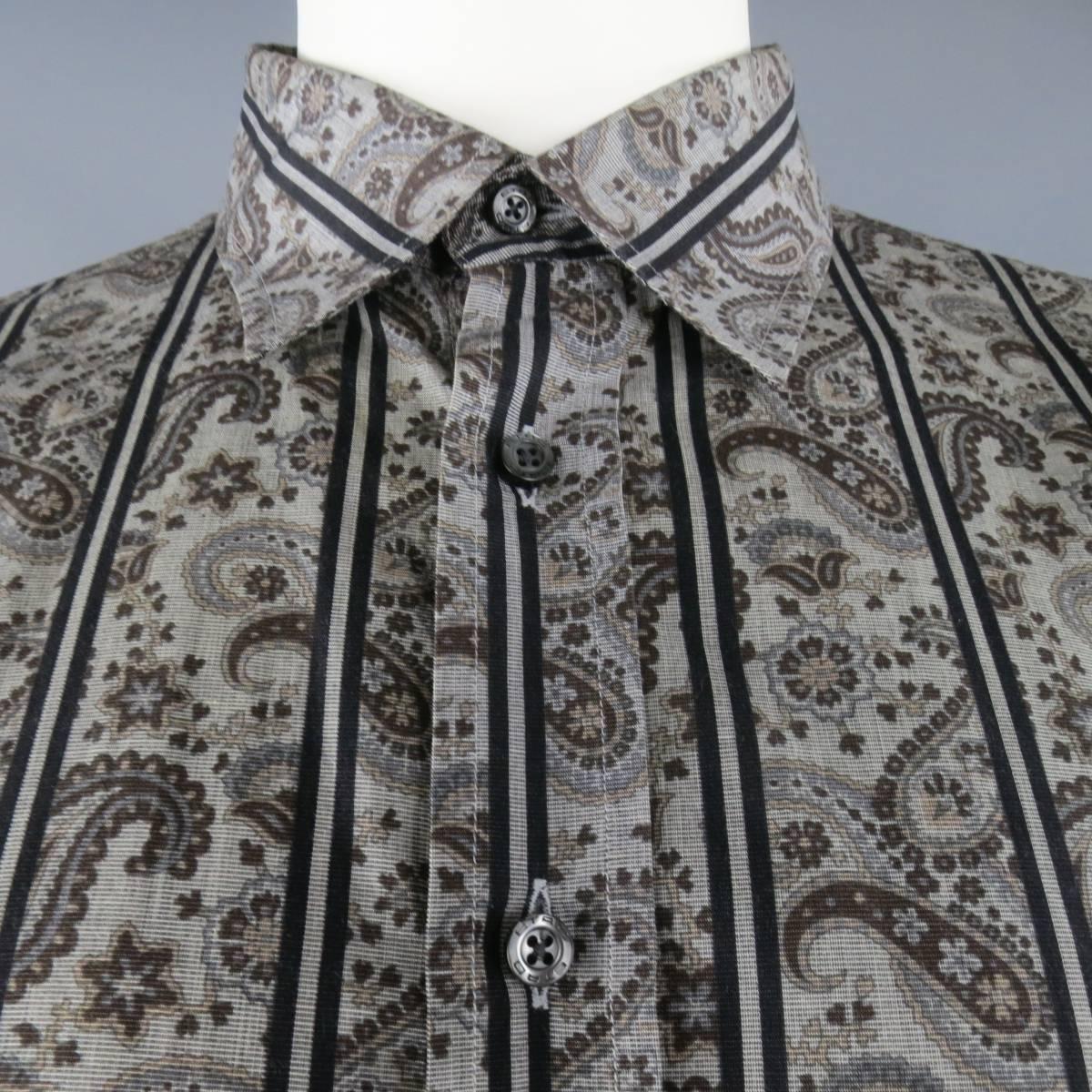 ETRO dress shirt in a gray,& taupe paisley black striped pattern cotton with a pointed collar. Made in Italy.
 
Good Pre-Owned Condition.
Marked: 46
 
Measurements:
 
Shoulder: 20 in.
Chest: 56 in.
Sleeve: 24.5 in.
Length: 34 in.


Web ID: 82978 
