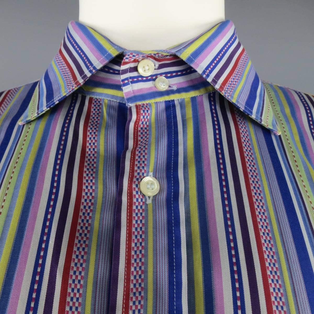 ETRO dress shirt in a multi color striped pattern cotton with hues of  blue & purple with a pointed spread collar. Made in Italy.
 
Good Pre-Owned Condition.
Marked: IT 46
 
Measurements:
 
Shoulder: 20 in.
Chest: 56 in.
Sleeve: 25.5 in.
Length: 35
