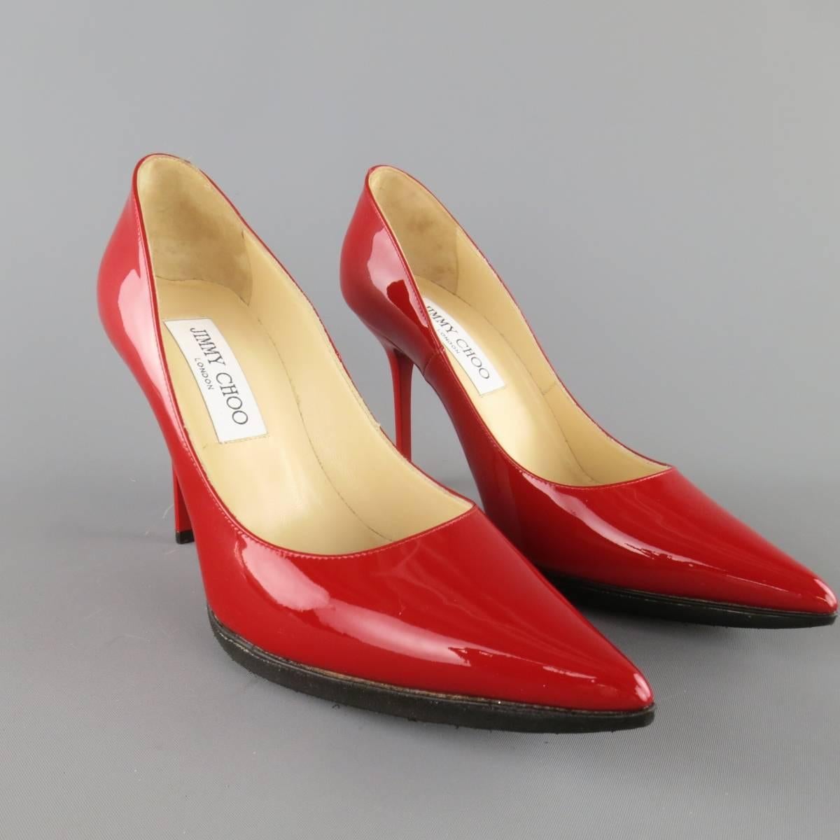Classic JIMMY CHOO pumps come in red patent leather and feature a pointed toe and lacquered stiletto heel. Thick black rubber sole added. As-Is. Made in Italy.
 
Excellent Pre-Owned Condition.
Marked: IT 35.5
 
Heel: 3.75 in.


Web ID: 83569 
