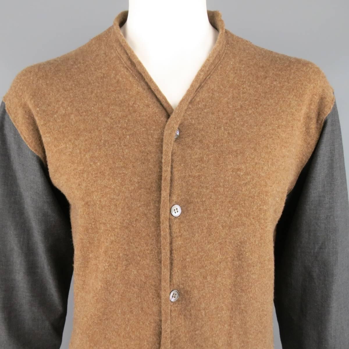 Vintage COMME des GARCONS cardigan shirt features a light brown knit body with rolled hem and charcoal dress shirt sleeves. Small holes and wear throughout. As-Is. Made in France.
 
Fair Pre-Owned Condition.
Marked: L
 
Measurements:
 
Shoulder: 23