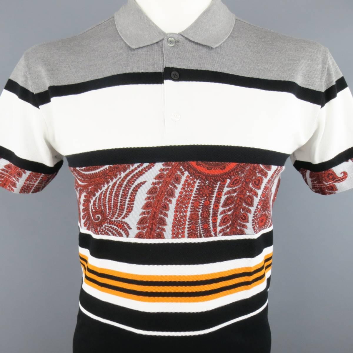 GIVENCHY by Riccardo Tisci polo comes in classic cotton pique with a gray, orange, black, and white paisley striped panel pattern and signature T cross stitch back. Made in Italy.
 
Excellent Pre-Owned Condition.
Marked: XL
 
Measurements:
