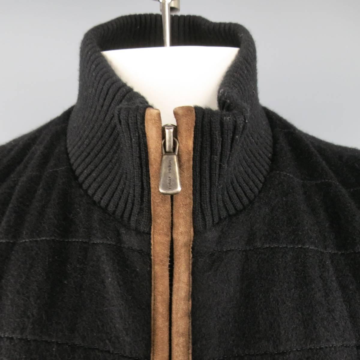 LORO PIANA fall/winter vest comes in a black cashmere and features a high ribbed collar, double zip closure, slit pockets, and tan suede piping. Wear throughout. Made in Italy.
 
Good Pre-Owned Condition.
Marked: XL
 
Measurements:
 
Shoulder: 18.5